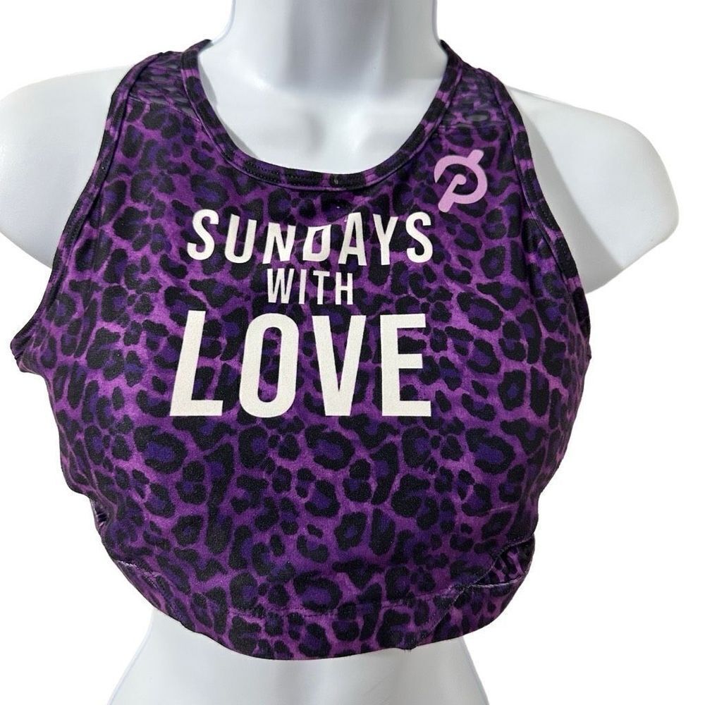 With peloton Sunday with love sports bra, purple and black size M. A 525.